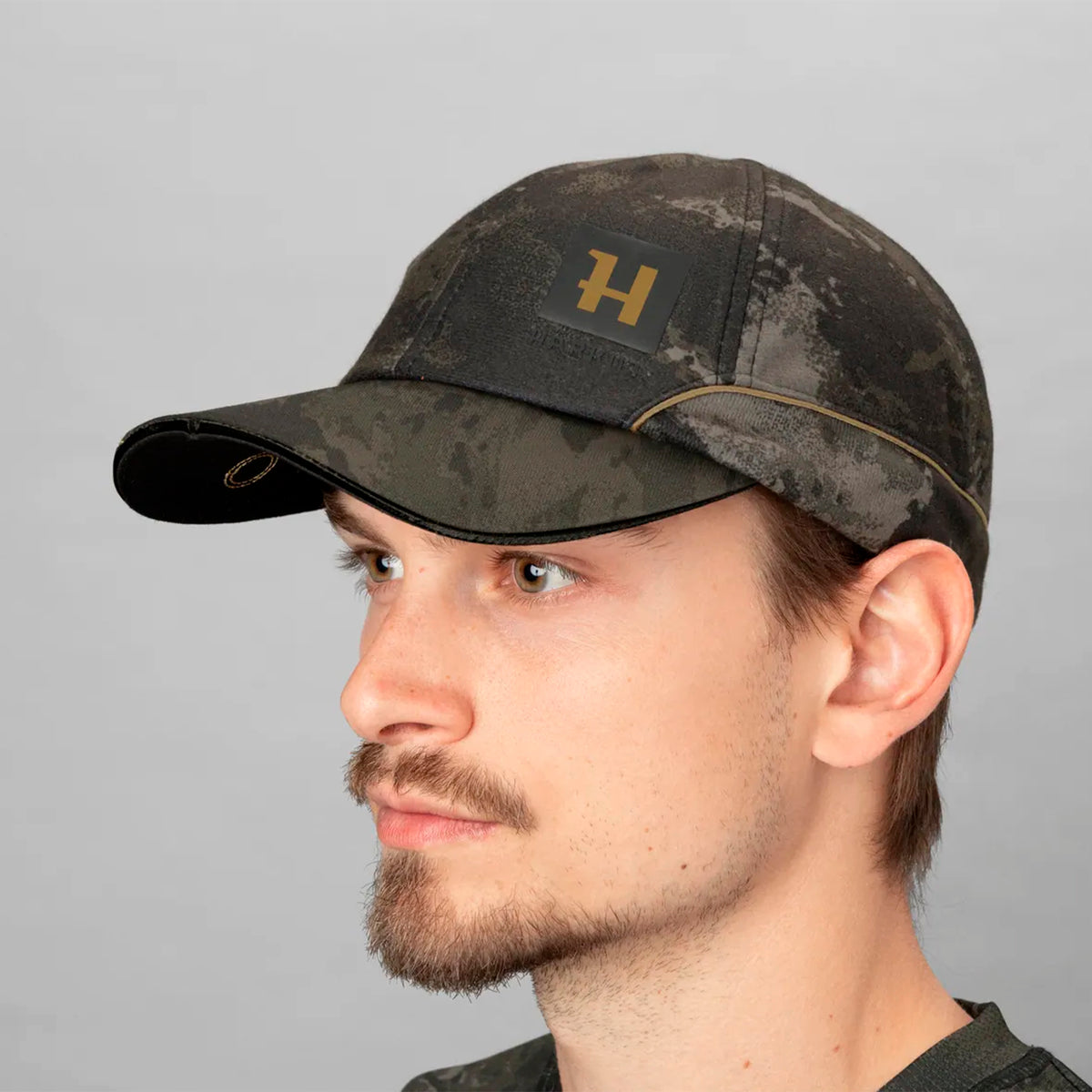 Gorra con luz LED Härkila Noctyx Camo Light