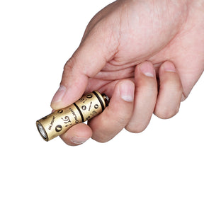Linterna llavero Olight i16 Brass Anniversary – edición limitada 16.º aniversario, recargable